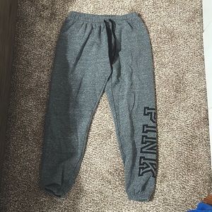 Pink brand joggers. Size medium. Grey color with black strings and logo